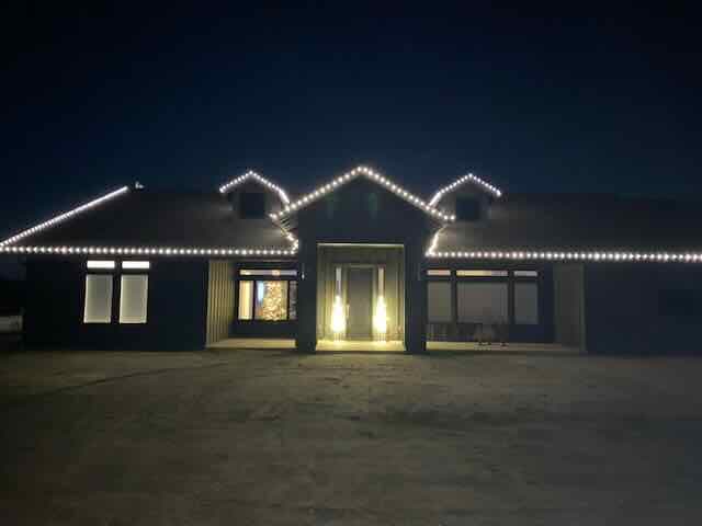 Home decorated with professionally installed Christmas lights